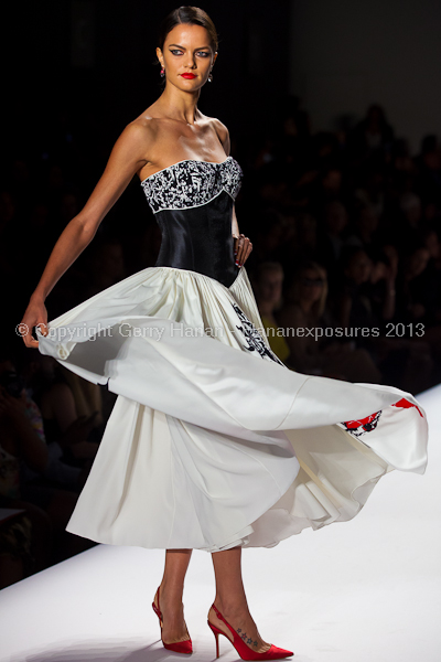 A model on the runway at the Norisol Ferrari SS2013 show at New York Mercedes-Benz Fashion Week.