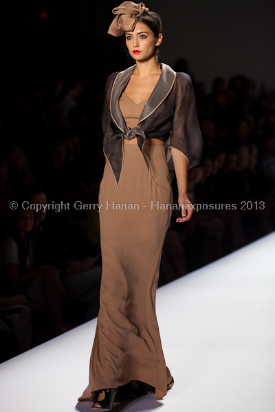 A model on the runway at the Norisol Ferrari SS2013 show at New York Mercedes-Benz Fashion Week.