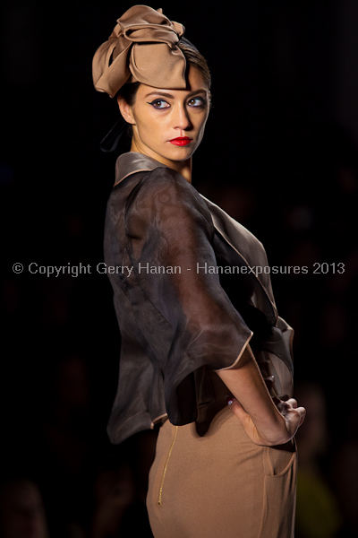 A model on the runway at the Norisol Ferrari SS2013 show at New York Mercedes-Benz Fashion Week.