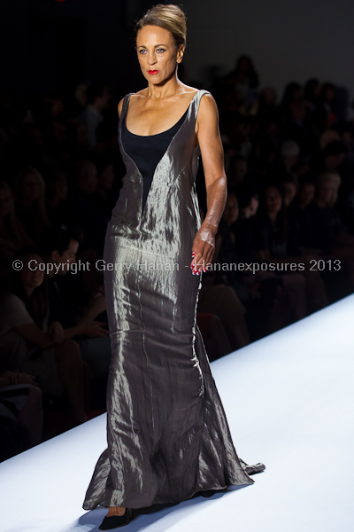A model on the runway at the Norisol Ferrari SS2013 show at New York Mercedes-Benz Fashion Week.