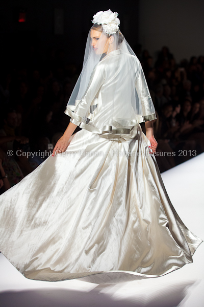 A model on the runway at the Norisol Ferrari SS2013 show at New York Mercedes-Benz Fashion Week.