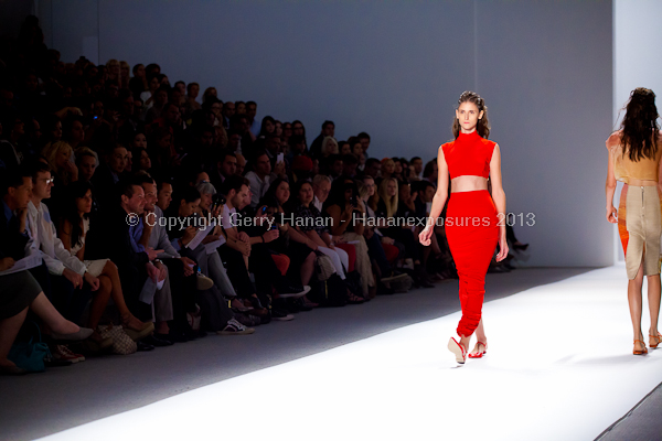 A model on the runway at the Osklen SS2013 show at New York Mercedes-Benz Fashion Week.