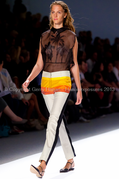 A model on the runway at the Osklen SS2013 show at New York Mercedes-Benz Fashion Week.