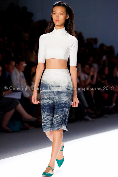 A model on the runway at the Osklen SS2013 show at New York Mercedes-Benz Fashion Week.