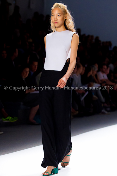 A model on the runway at the Osklen SS2013 show at New York Mercedes-Benz Fashion Week.