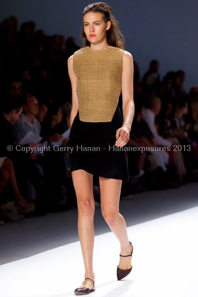 A model on the runway at the Osklen SS2013 show at New York Mercedes-Benz Fashion Week.