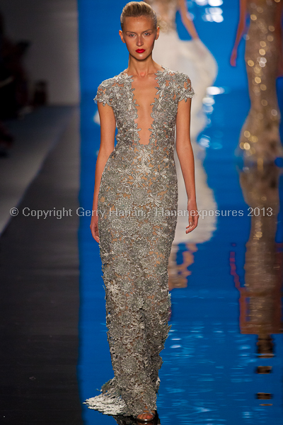 A model on the runway at the Reem Acra SS2013 show at New York Mercedes-Benz Fashion Week.