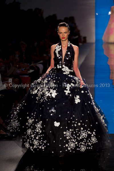 A model on the runway at the Reem Acra SS2013 show at New York Mercedes-Benz Fashion Week.