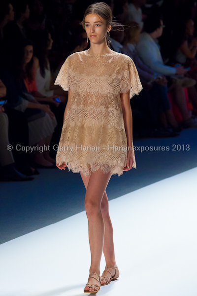 A model on the Tadashi Shoji SS2013 runway show during New York Mercedes-Benz Fashion Week.