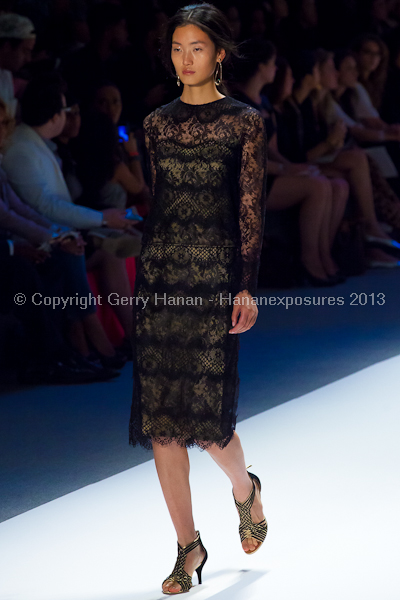 A model on the Tadashi Shoji SS2013 runway show during New York Mercedes-Benz Fashion Week.