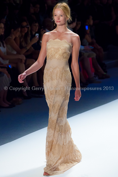 A model on the Tadashi Shoji SS2013 runway show during New York Mercedes-Benz Fashion Week.