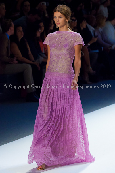 A model on the Tadashi Shoji SS2013 runway show during New York Mercedes-Benz Fashion Week.