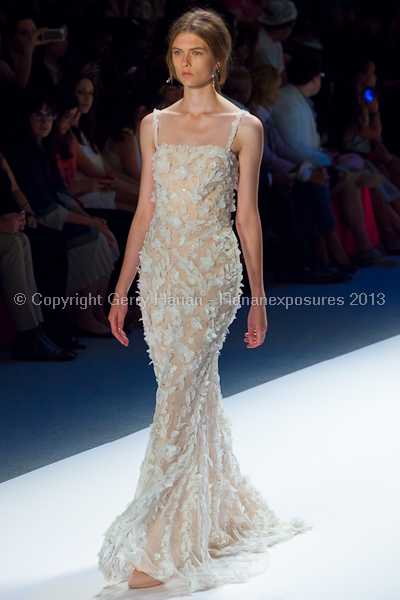 A model on the Tadashi Shoji SS2013 runway show during New York Mercedes-Benz Fashion Week.