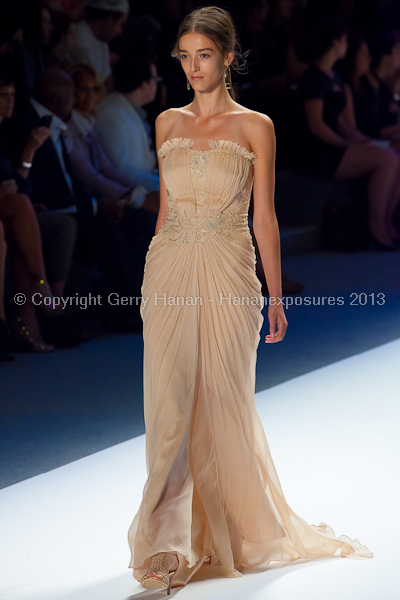 A model on the Tadashi Shoji SS2013 runway show during New York Mercedes-Benz Fashion Week.