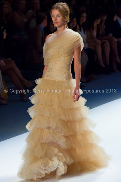 A model on the Tadashi Shoji SS2013 runway show during New York Mercedes-Benz Fashion Week.