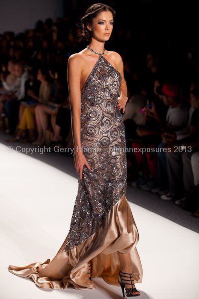 A model on the runway at the Venexiana SS2013 show at New York Mercedes-Benz Fashion Week.