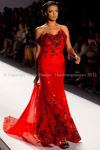 A model on the runway at the Venexiana SS2013 show at New York Mercedes-Benz Fashion Week.