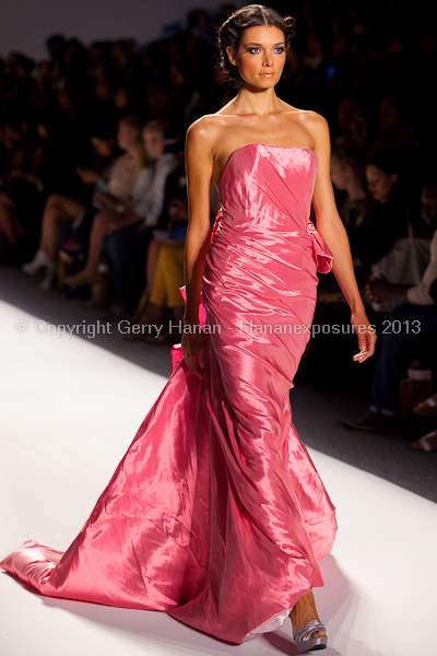 A model on the runway at the Venexiana SS2013 show at New York Mercedes-Benz Fashion Week.