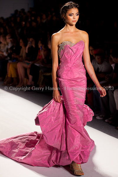 A model on the runway at the Venexiana SS2013 show at New York Mercedes-Benz Fashion Week.