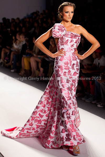 A model on the runway at the Venexiana SS2013 show at New York Mercedes-Benz Fashion Week.