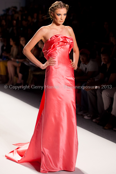 A model on the runway at the Venexiana SS2013 show at New York Mercedes-Benz Fashion Week.