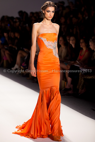 A model on the runway at the Venexiana SS2013 show at New York Mercedes-Benz Fashion Week.