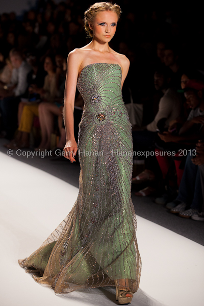 A model on the runway at the Venexiana SS2013 show at New York Mercedes-Benz Fashion Week.