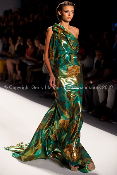 A model on the runway at the Venexiana SS2013 show at New York Mercedes-Benz Fashion Week.