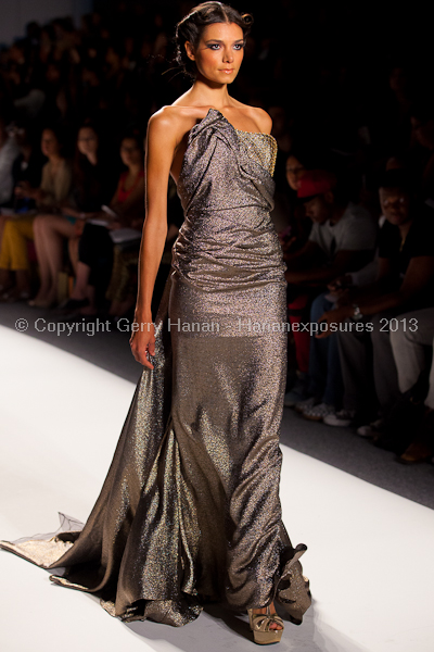 A model on the runway at the Venexiana SS2013 show at New York Mercedes-Benz Fashion Week.