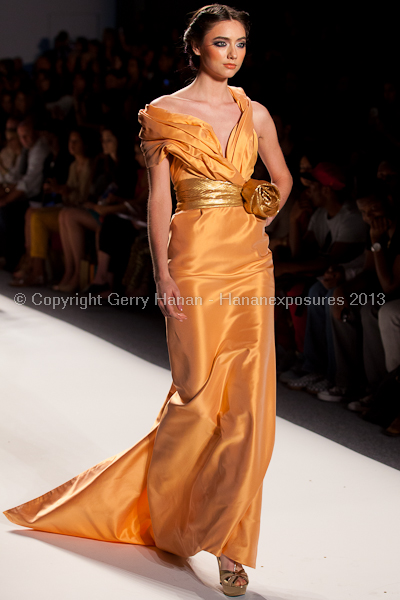 A model on the runway at the Venexiana SS2013 show at New York Mercedes-Benz Fashion Week.