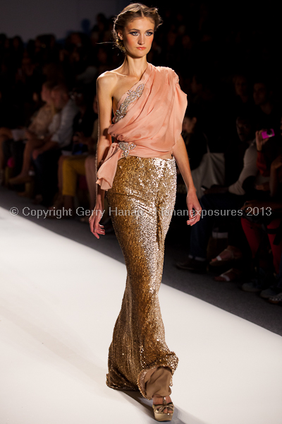 A model on the runway at the Venexiana SS2013 show at New York Mercedes-Benz Fashion Week.