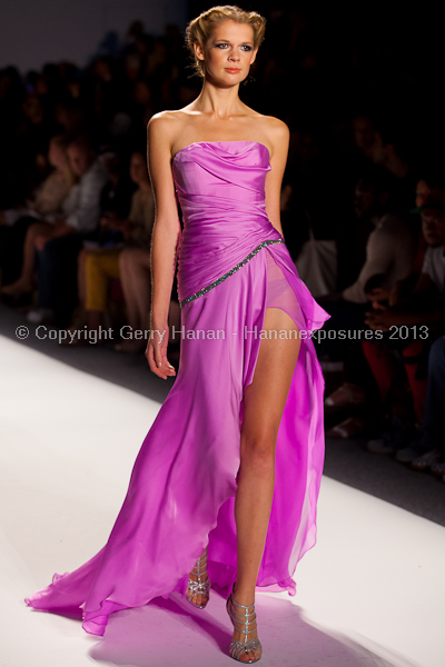 A model on the runway at the Venexiana SS2013 show at New York Mercedes-Benz Fashion Week.