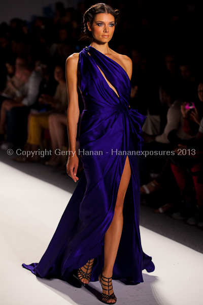 A model on the runway at the Venexiana SS2013 show at New York Mercedes-Benz Fashion Week.