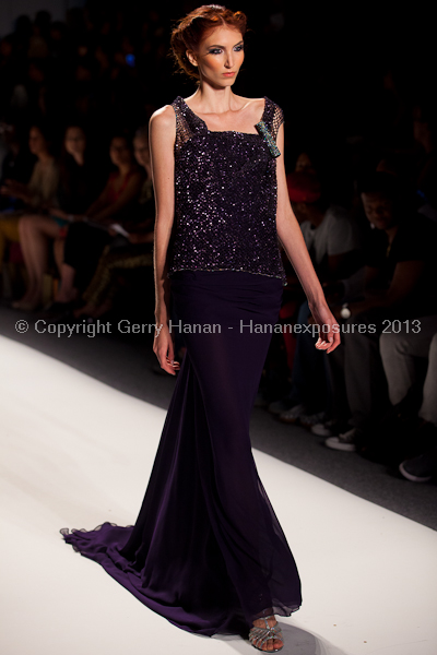 A model on the runway at the Venexiana SS2013 show at New York Mercedes-Benz Fashion Week.