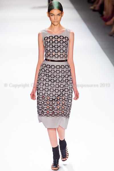 A model on the runway at the Vivienne Tam SS2013 show at New York Mercedes-Benz Fashion Week.