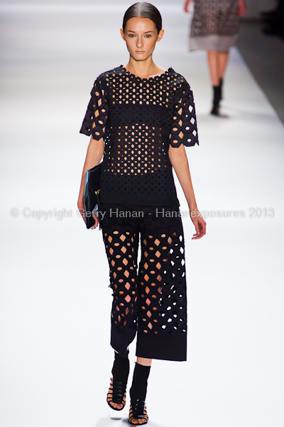 A model on the runway at the Vivienne Tam SS2013 show at New York Mercedes-Benz Fashion Week.