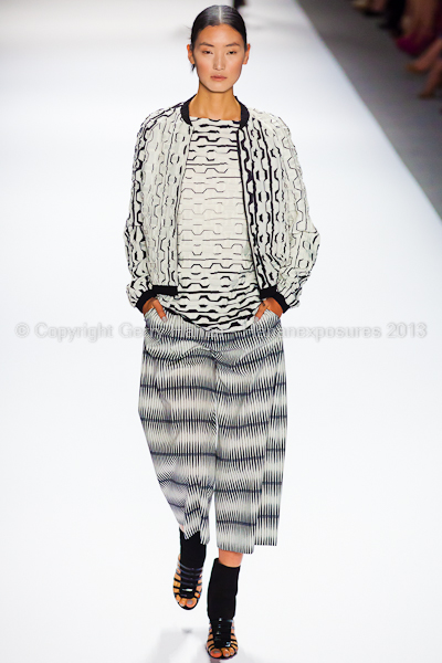 A model on the runway at the Vivienne Tam SS2013 show at New York Mercedes-Benz Fashion Week.