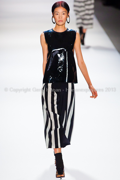 A model on the runway at the Vivienne Tam SS2013 show at New York Mercedes-Benz Fashion Week.