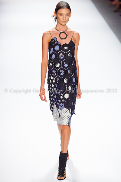 A model on the runway at the Vivienne Tam SS2013 show at New York Mercedes-Benz Fashion Week.