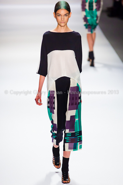 A model on the runway at the Vivienne Tam SS2013 show at New York Mercedes-Benz Fashion Week.