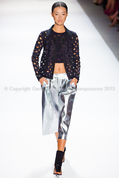 A model on the runway at the Vivienne Tam SS2013 show at New York Mercedes-Benz Fashion Week.