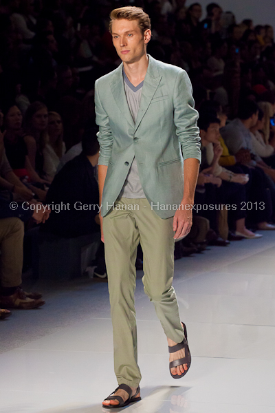 A model on the runway at the Vlov Qingqing Wu SS2013 show at New York Mercedes-Benz Fashion Week.