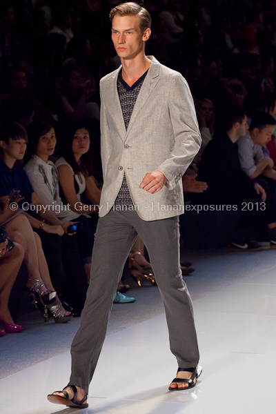 A model on the runway at the Vlov Qingqing Wu SS2013 show at New York Mercedes-Benz Fashion Week.