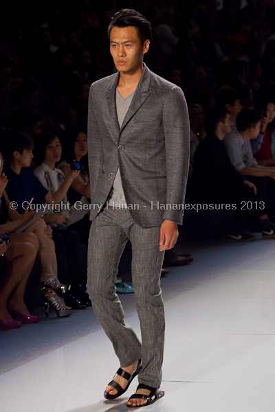 A model on the runway at the Vlov Qingqing Wu SS2013 show at New York Mercedes-Benz Fashion Week.