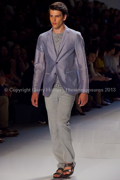 A model on the runway at the Vlov Qingqing Wu SS2013 show at New York Mercedes-Benz Fashion Week.