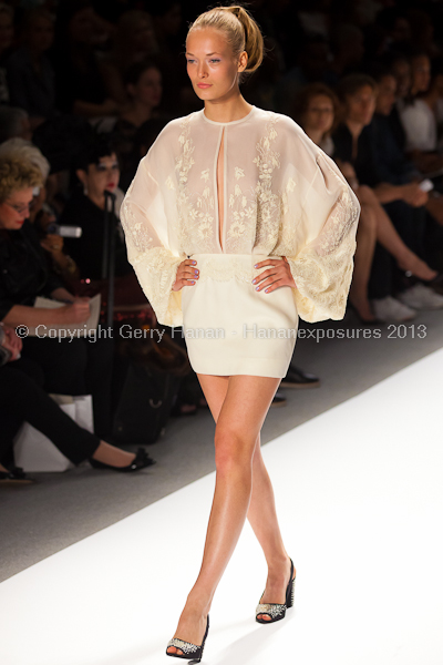 A model on the runway at the Zang Toi SS2013 show at New York Mercedes-Benz Fashion Week.