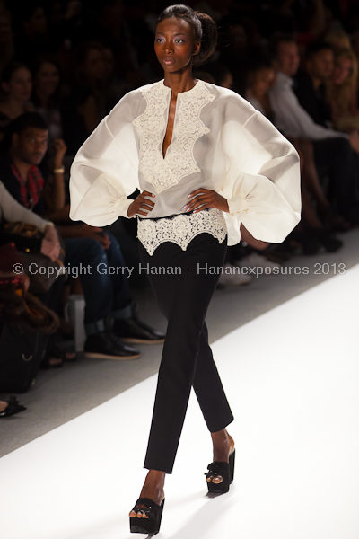 A model on the runway at the Zang Toi SS2013 show at New York Mercedes-Benz Fashion Week.