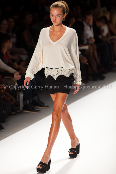 A model on the runway at the Zang Toi SS2013 show at New York Mercedes-Benz Fashion Week.