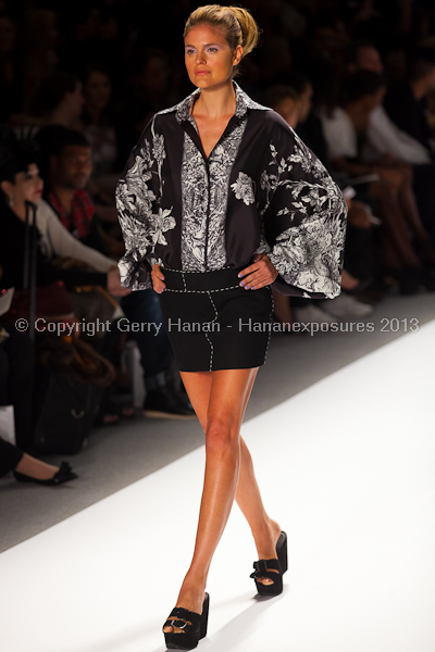 A model on the runway at the Zang Toi SS2013 show at New York Mercedes-Benz Fashion Week.