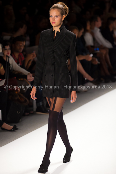 A model on the runway at the Zang Toi SS2013 show at New York Mercedes-Benz Fashion Week.